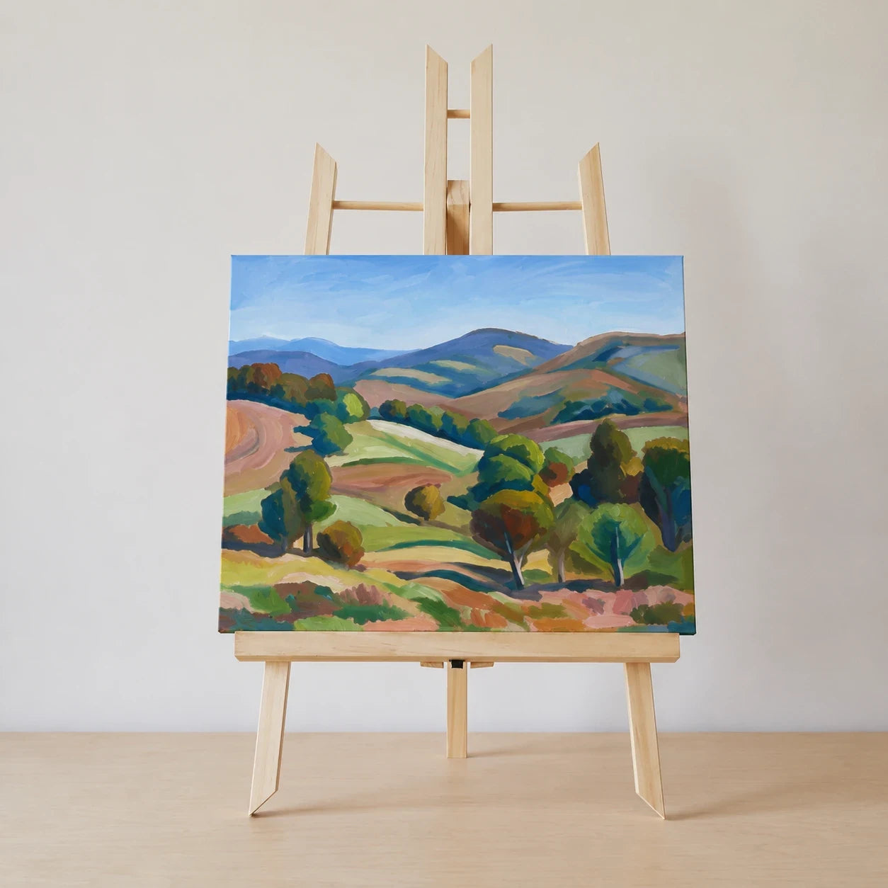 Afgerond schilderij op een houten tafelezel