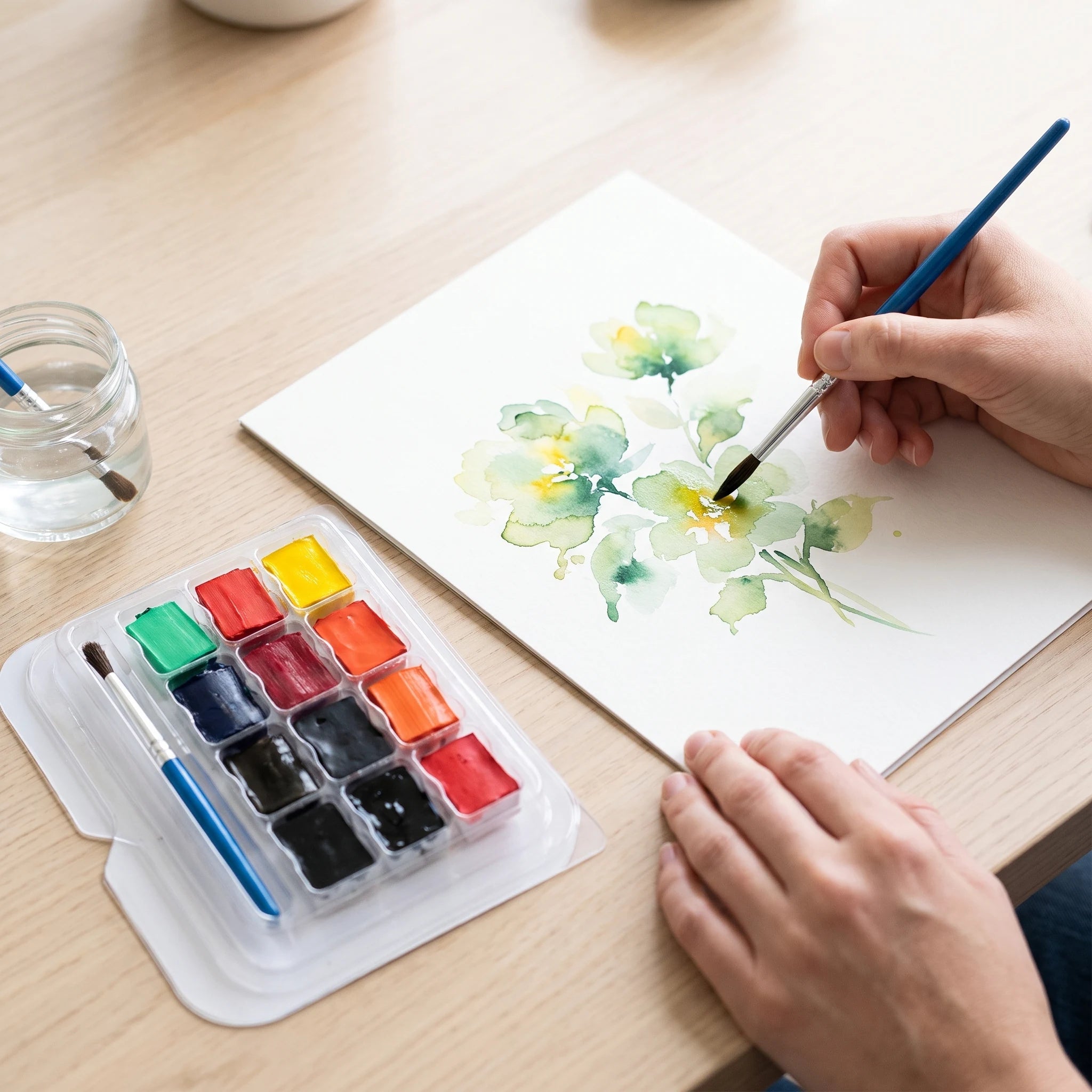 Schilderen met aquarelverf in halve napjes